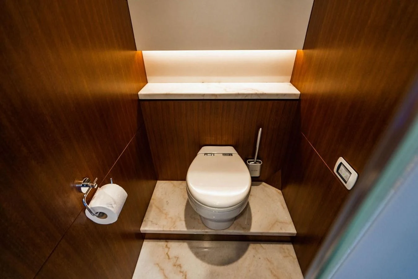 a toilet with a wooden seat aboard FAR NIENTE Yacht for Sale