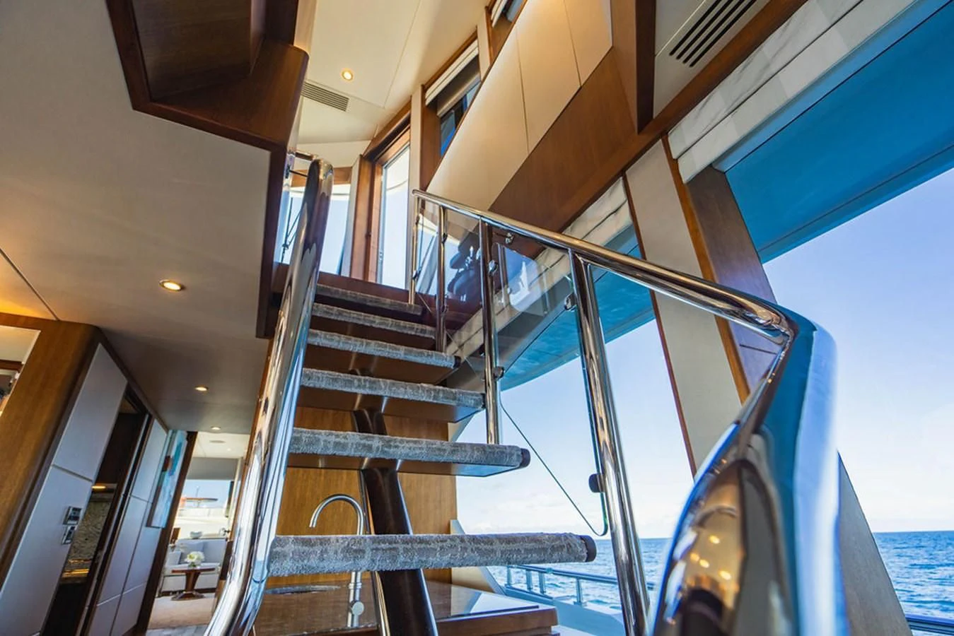 a staircase with a railing aboard FAR NIENTE Yacht for Sale