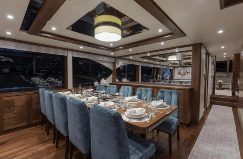 a large kitchen with a dining table aboard FAR NIENTE Yacht for Sale