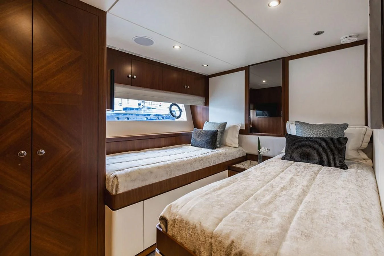 a room with a bed and a window aboard FAR NIENTE Yacht for Sale