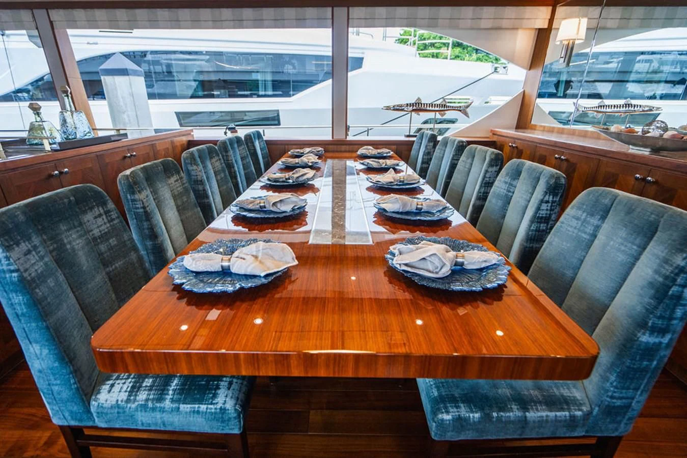 a table with plates and food on it aboard FAR NIENTE Yacht for Sale