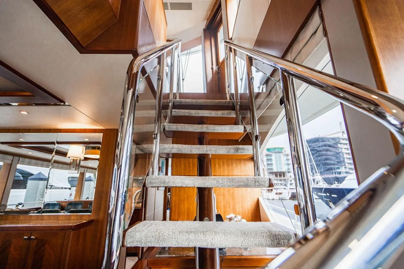a wooden staircase in a building aboard FAR NIENTE Yacht for Sale