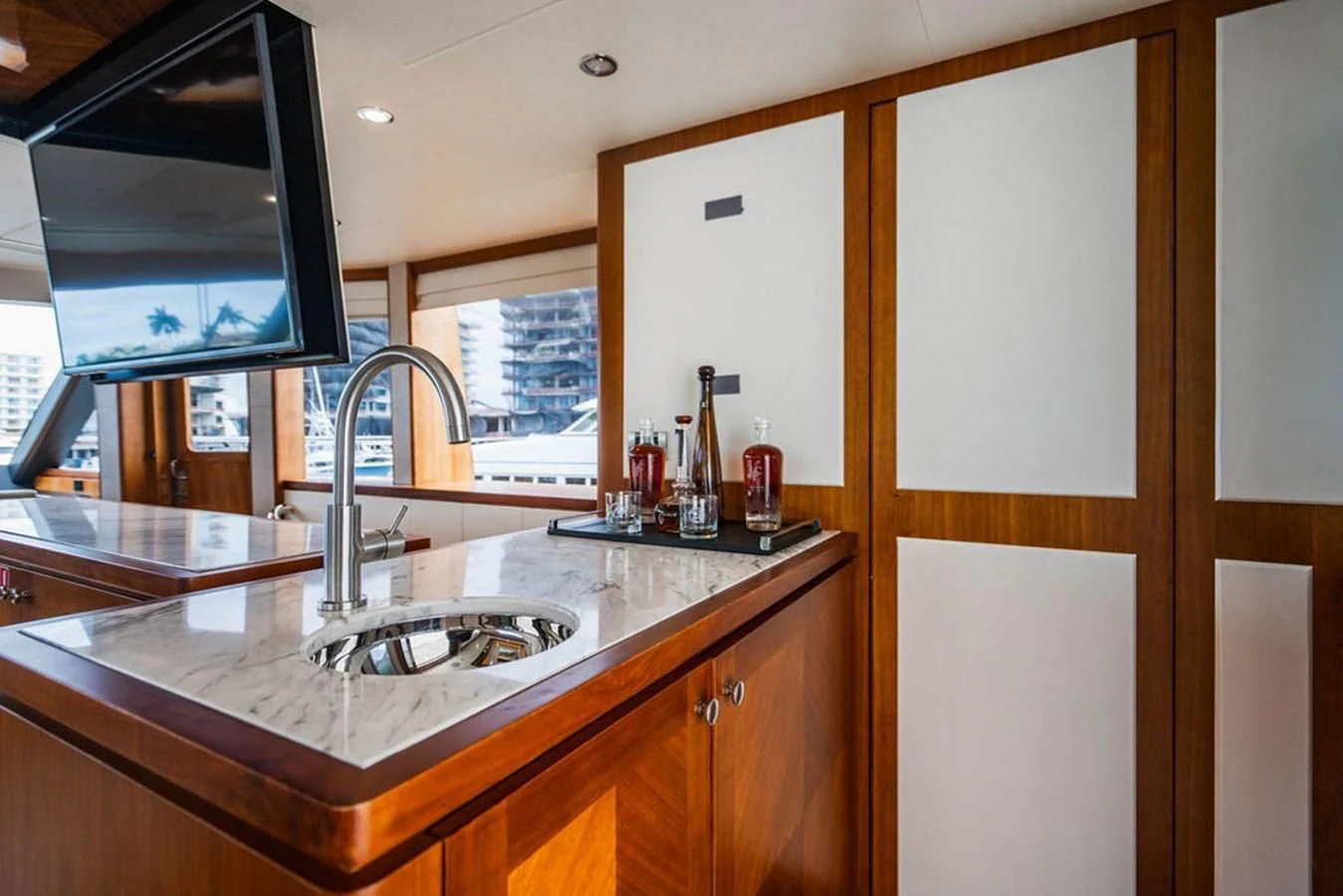 a kitchen with a sink and cabinets aboard FAR NIENTE Yacht for Sale