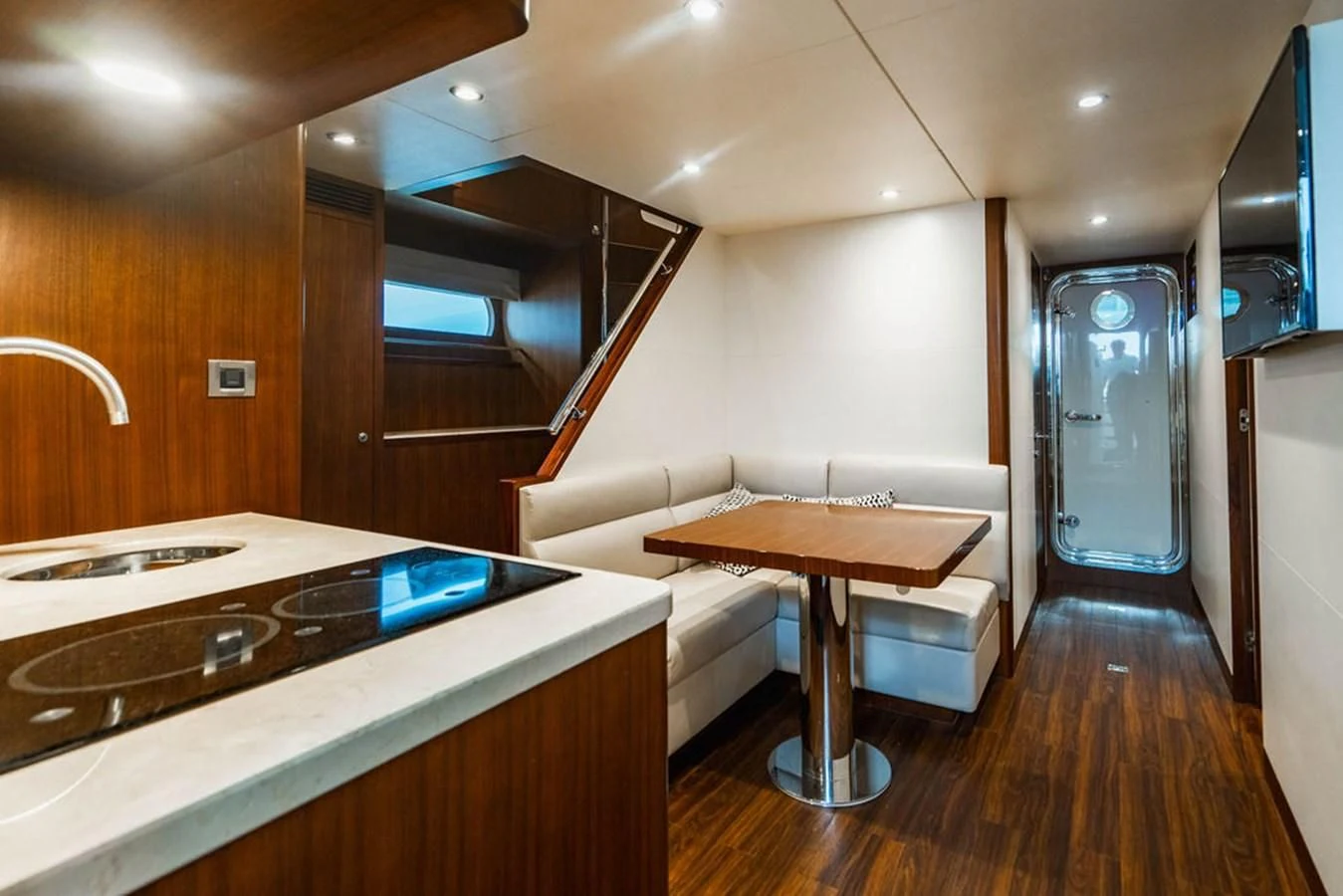 a kitchen with a table and a sink aboard FAR NIENTE Yacht for Sale