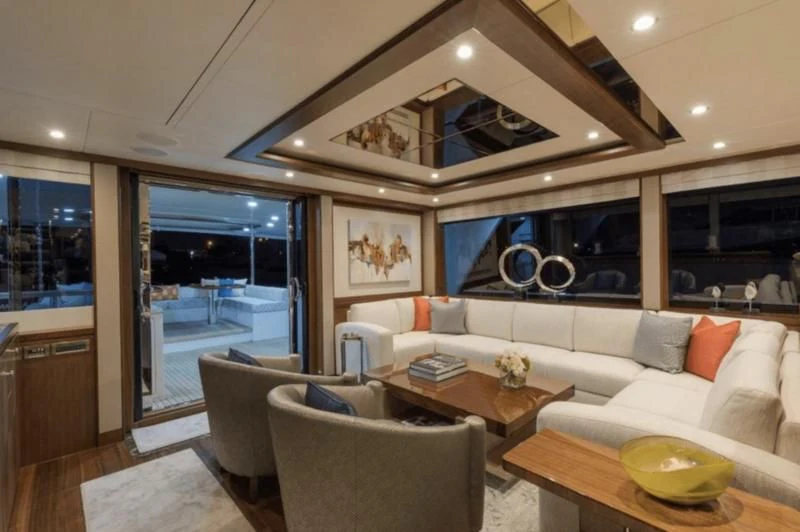 a living room with a large window aboard FAR NIENTE Yacht for Sale