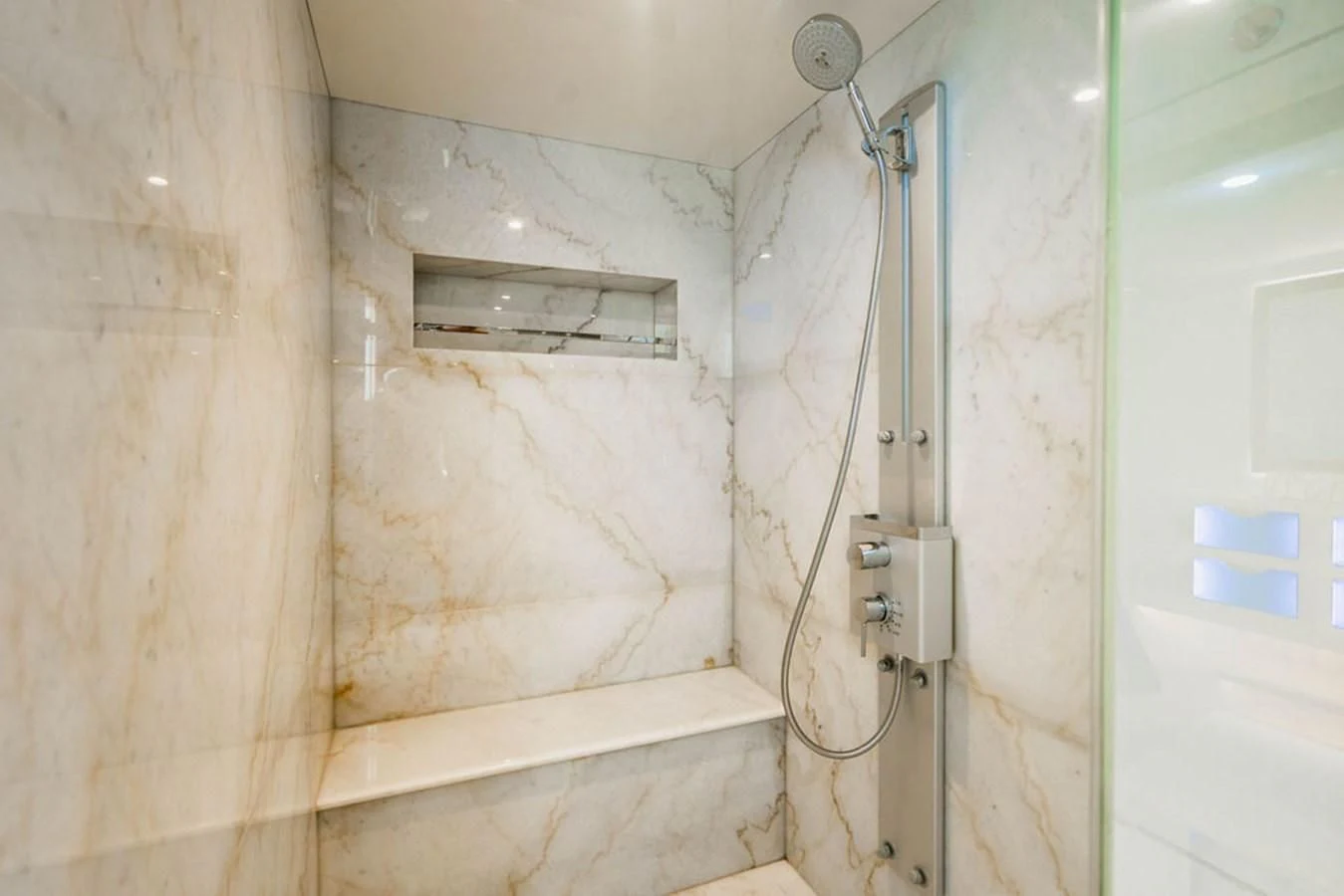 a wall with pipes and wires aboard FAR NIENTE Yacht for Sale