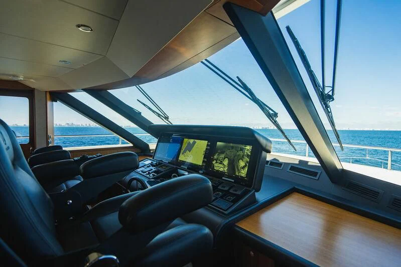 inside of a car with a laptop on the dashboard aboard FAR NIENTE Yacht for Sale