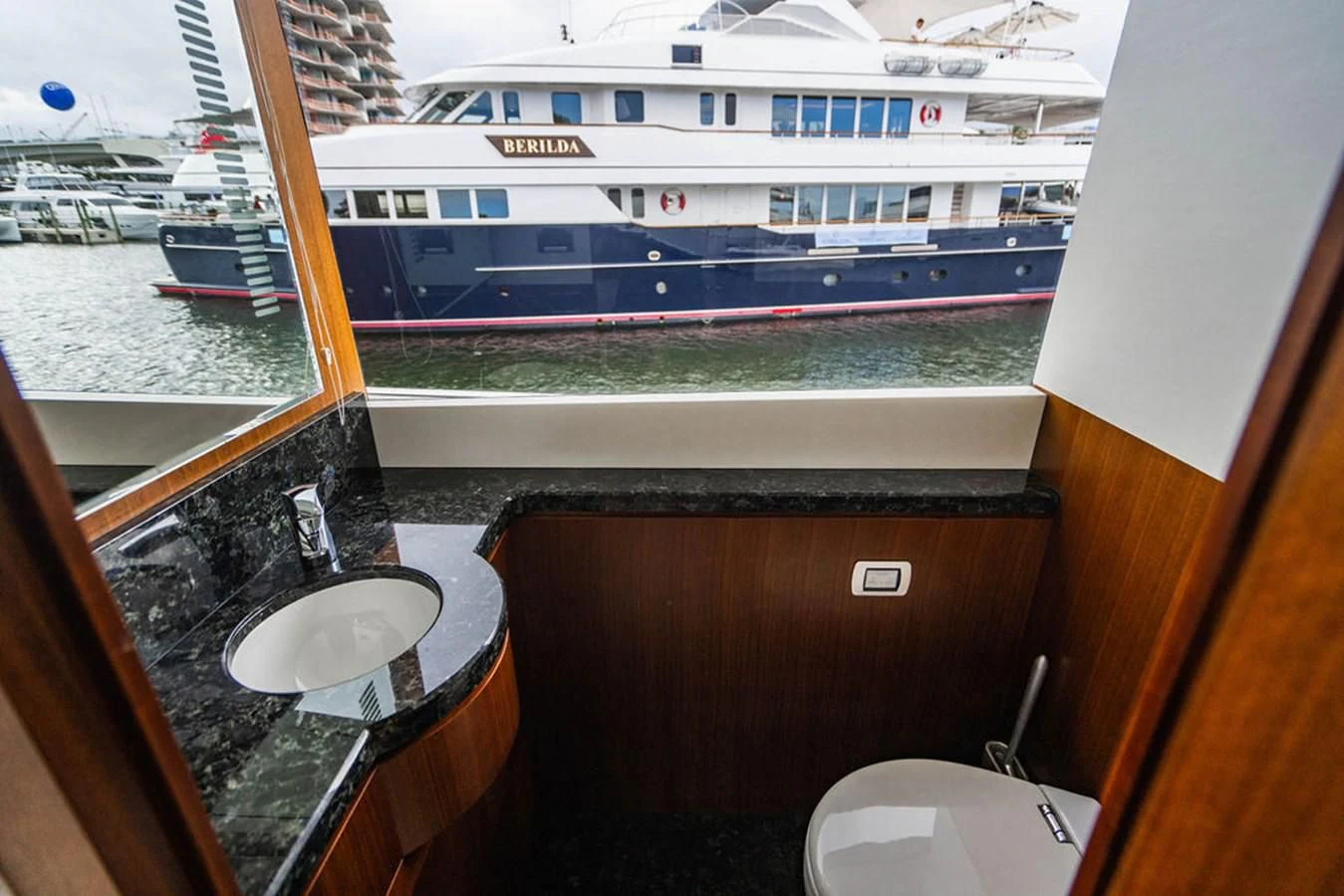 a large white ship docked aboard FAR NIENTE Yacht for Sale