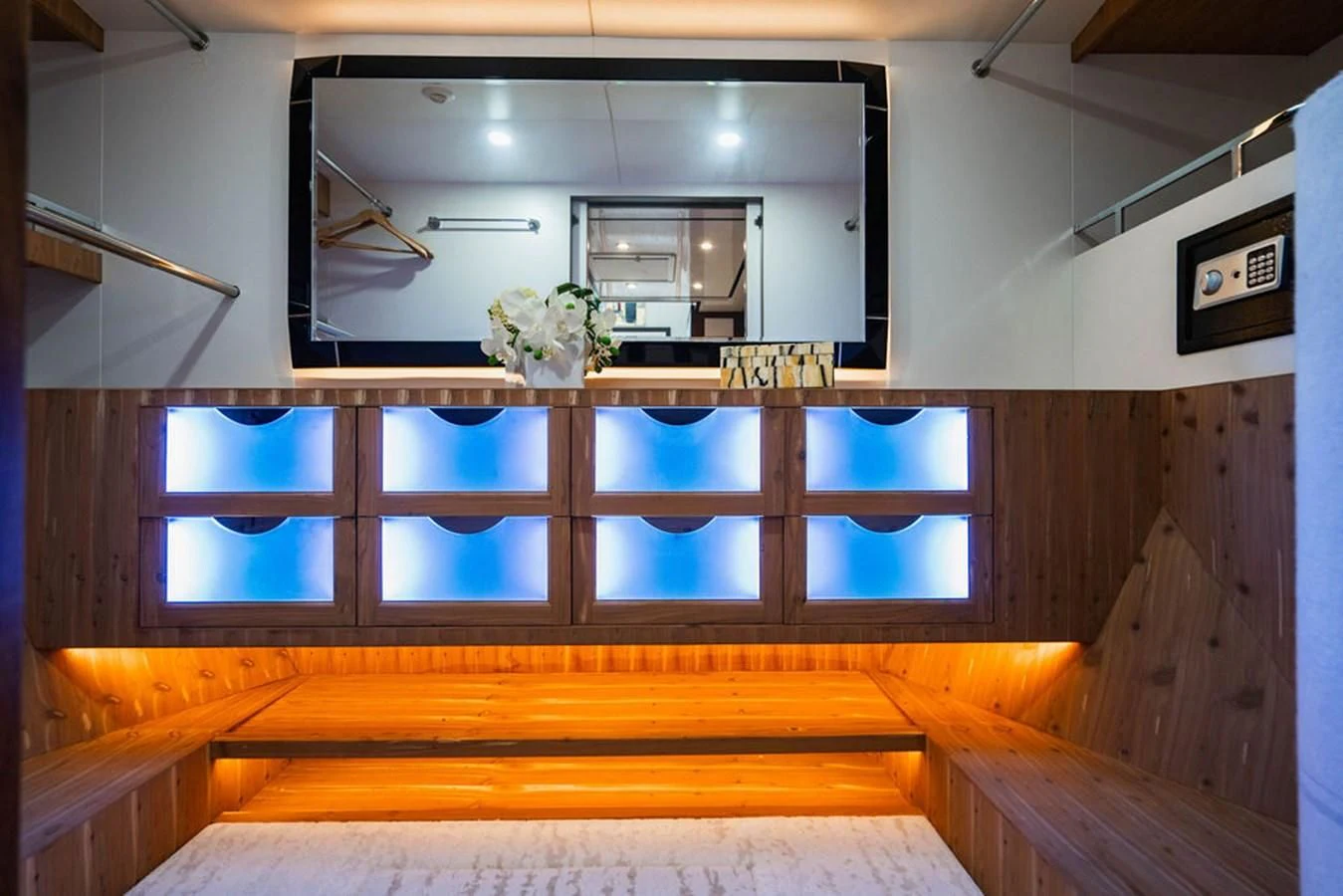 a room with a bench and a mirror aboard FAR NIENTE Yacht for Sale