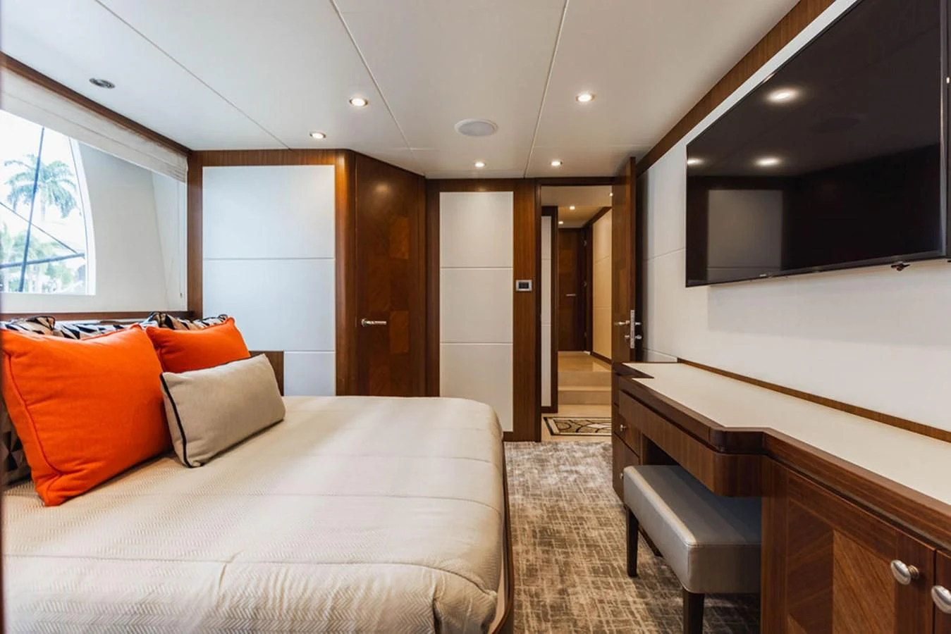 a room with a bed and a desk aboard FAR NIENTE Yacht for Sale