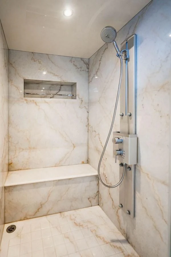 a bathroom with a shower and a sink aboard FAR NIENTE Yacht for Sale