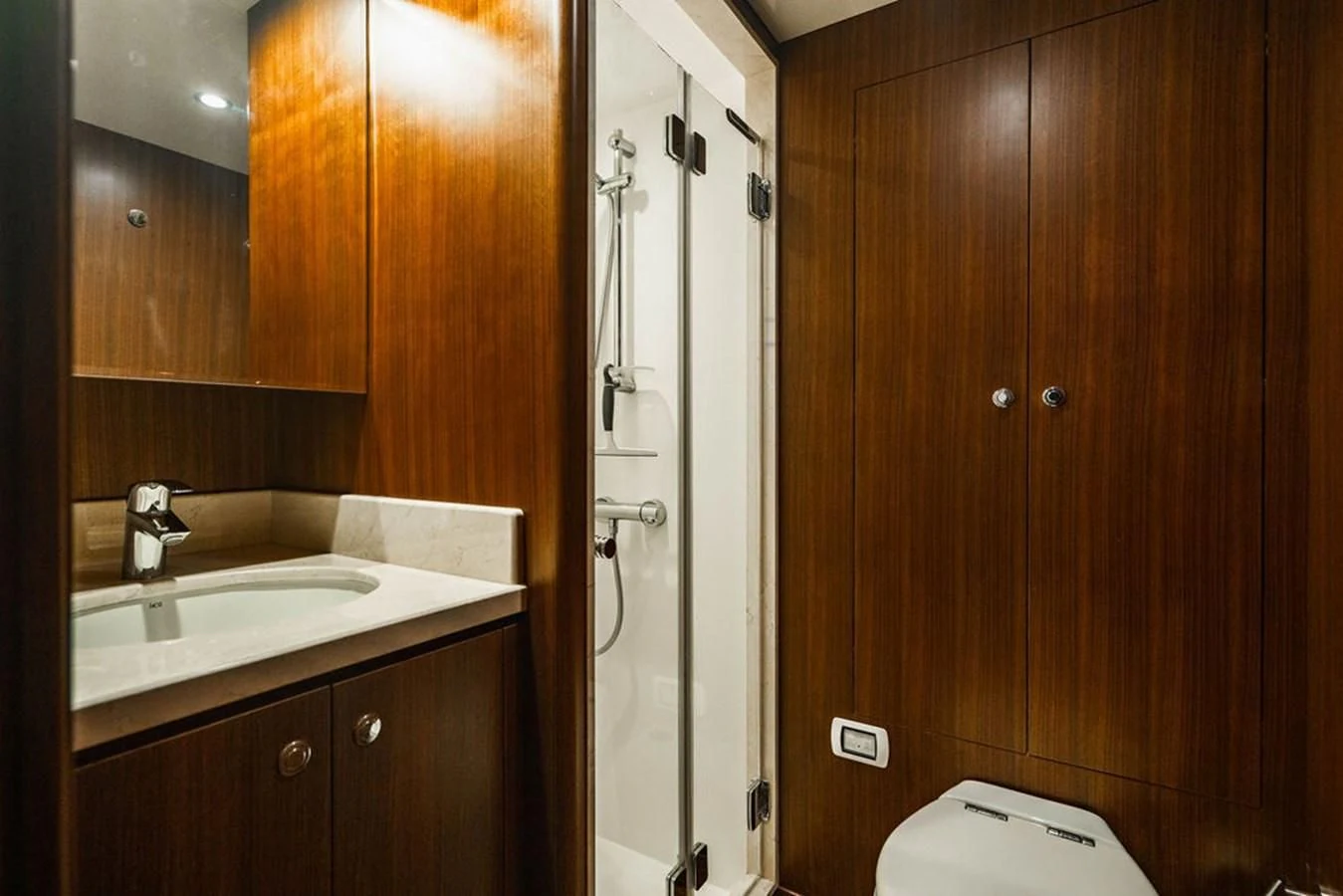 a bathroom with a shower and sink aboard FAR NIENTE Yacht for Sale