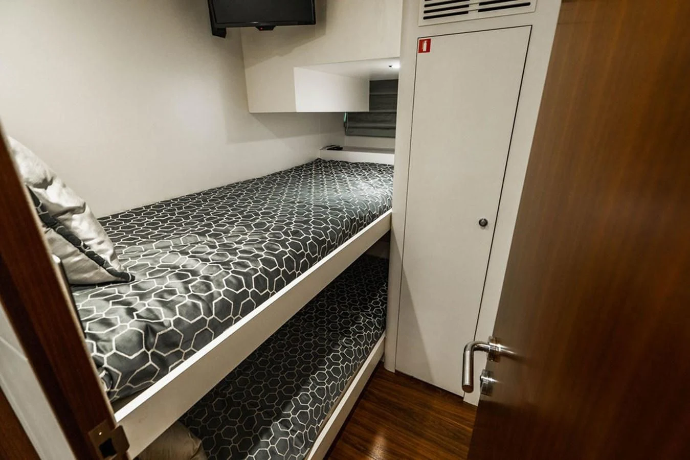 a bedroom with a bed aboard FAR NIENTE Yacht for Sale