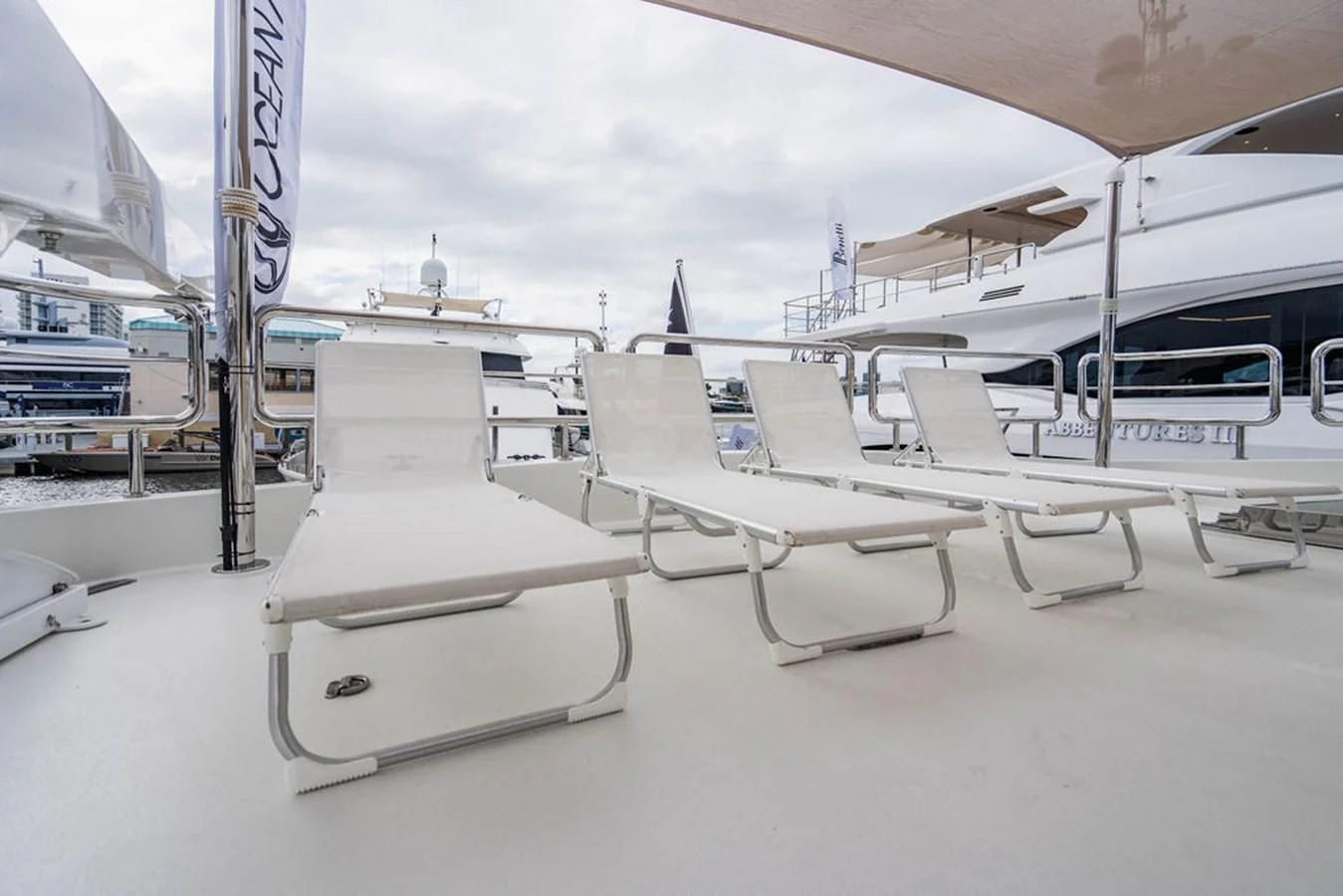 a group of white chairs on a white surface aboard FAR NIENTE Yacht for Sale