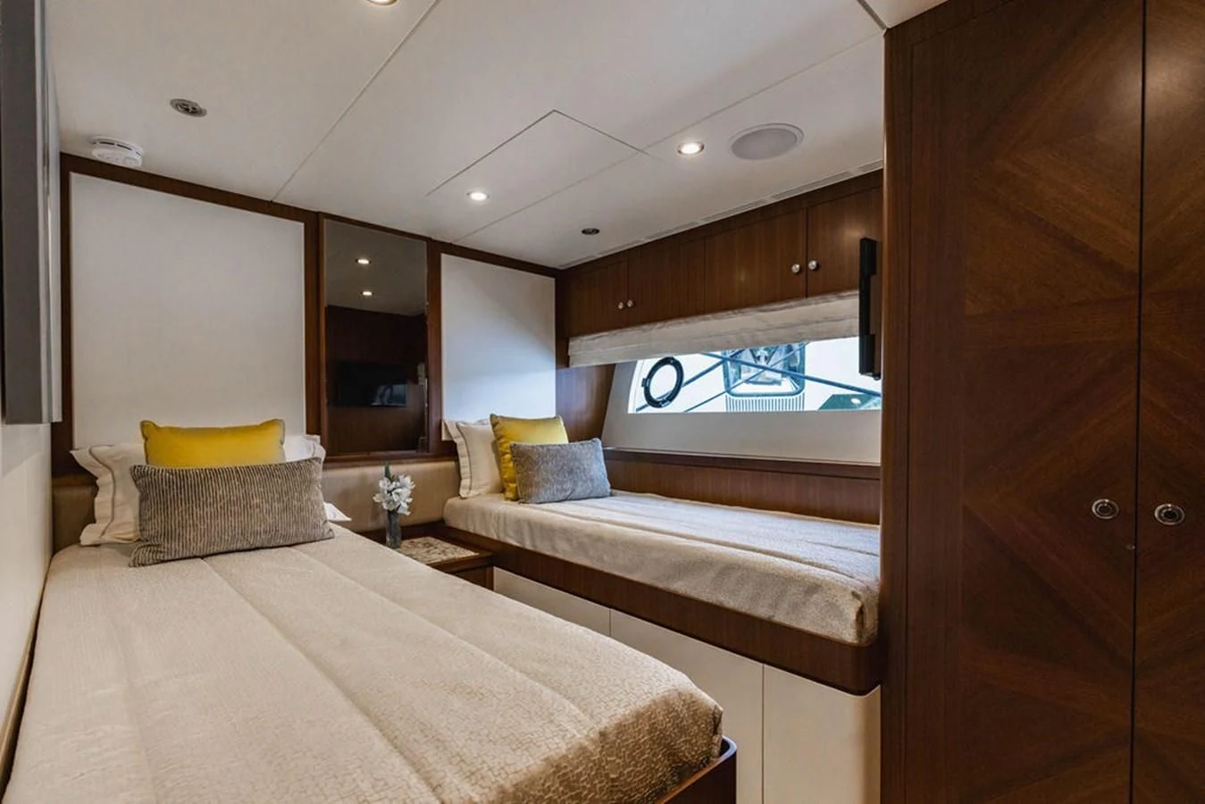 a room with two beds aboard FAR NIENTE Yacht for Sale
