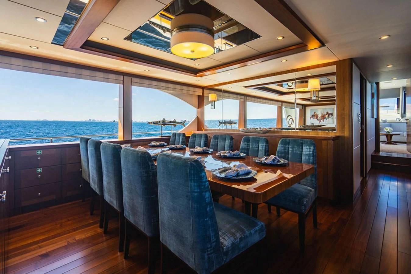 a dining room with a large table aboard FAR NIENTE Yacht for Sale