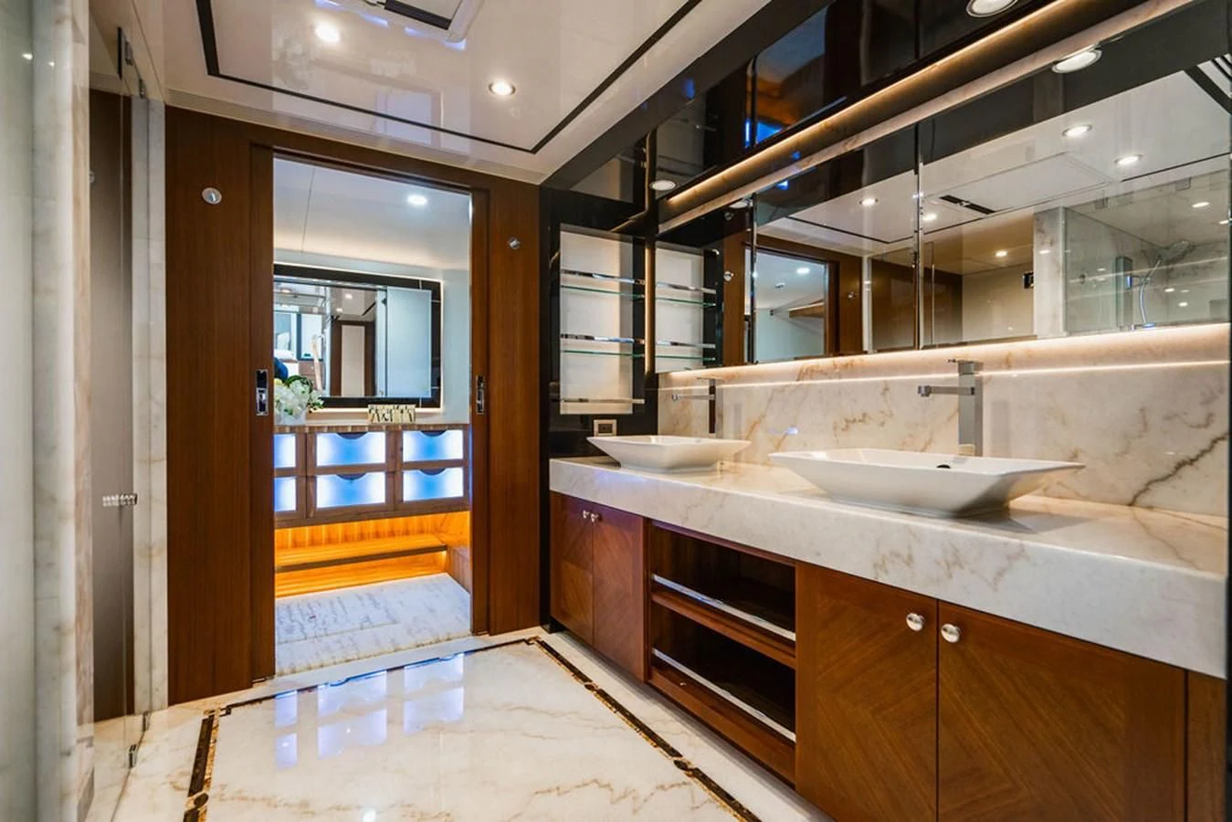 a bathroom with a sink and a mirror aboard FAR NIENTE Yacht for Sale