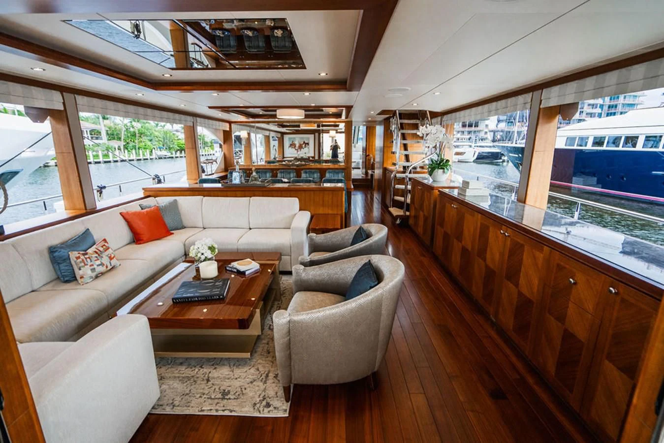 a living room with a large window aboard FAR NIENTE Yacht for Sale