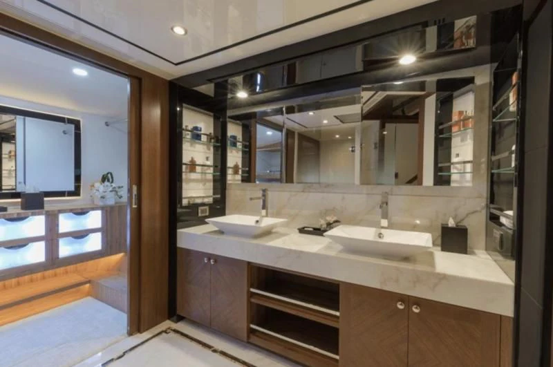 a bathroom with sinks and mirrors aboard FAR NIENTE Yacht for Sale