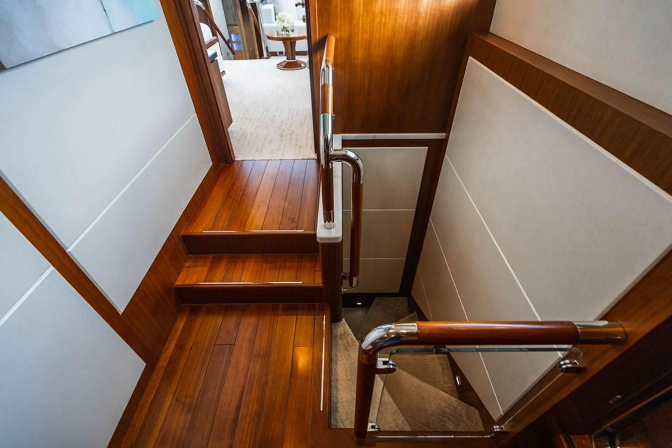 a wooden staircase in a house aboard FAR NIENTE Yacht for Sale