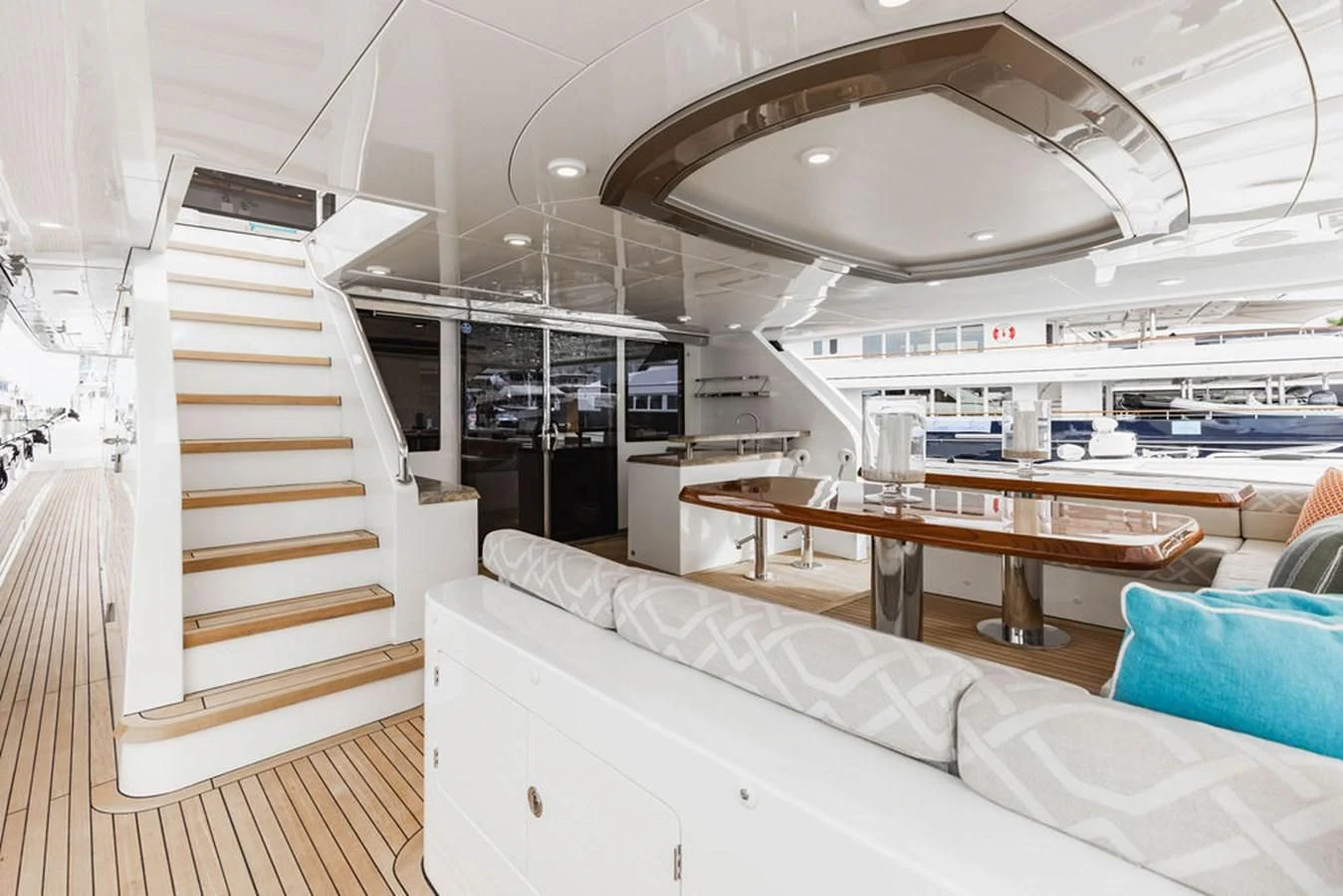 a room with a staircase and a couch aboard FAR NIENTE Yacht for Sale