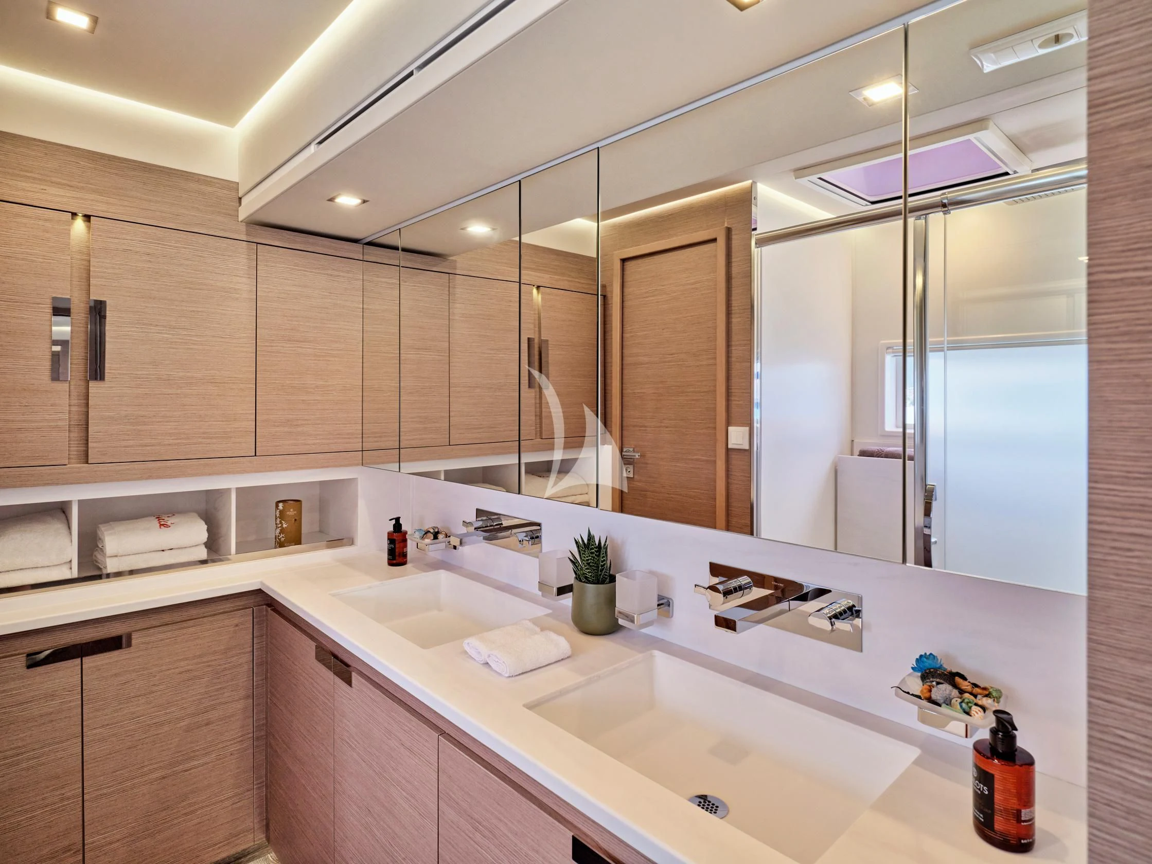 a bathroom with a large mirror aboard PIXIE Yacht for Charter