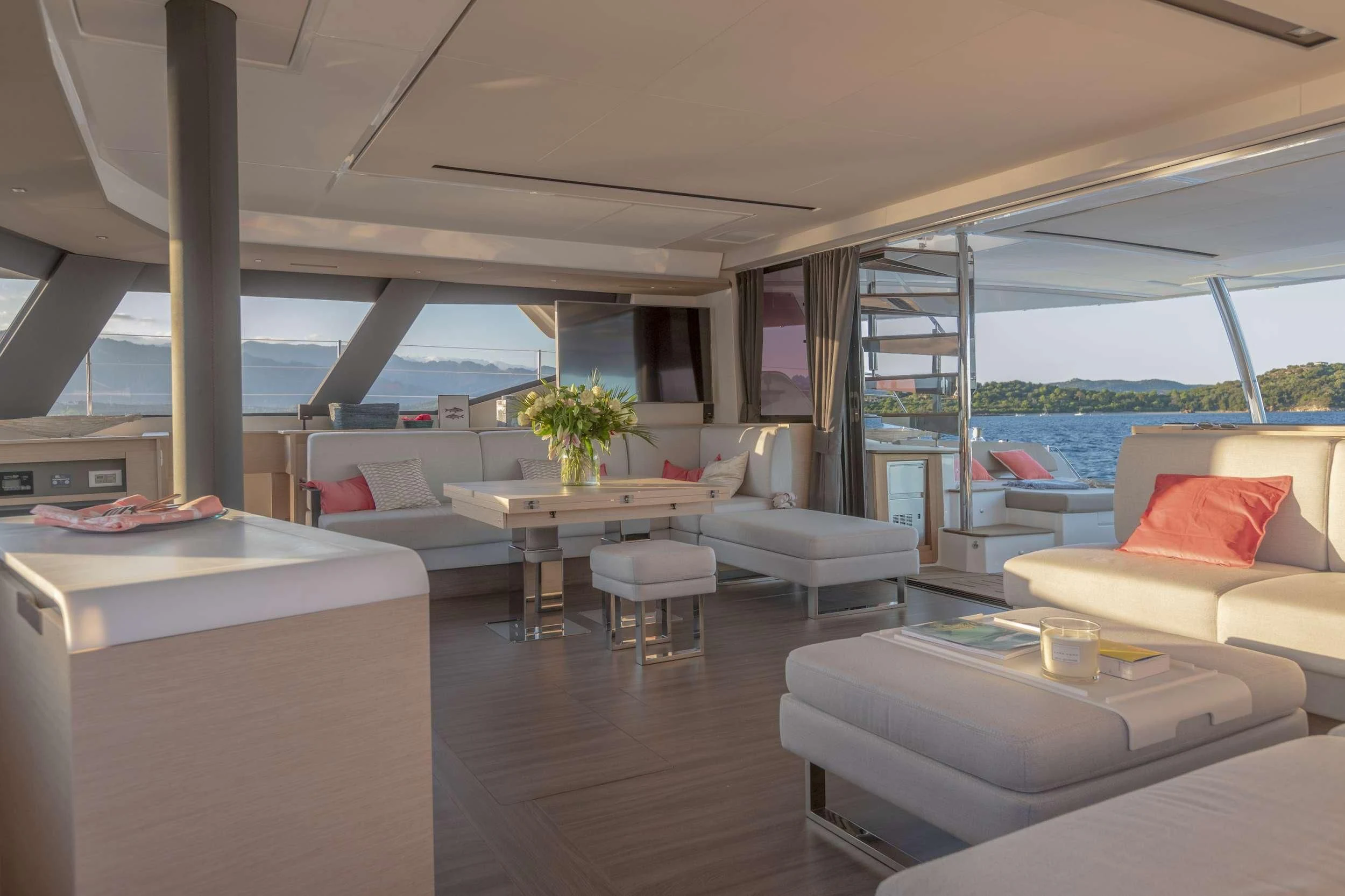 a room with a couch and a table aboard PIXIE Yacht for Charter