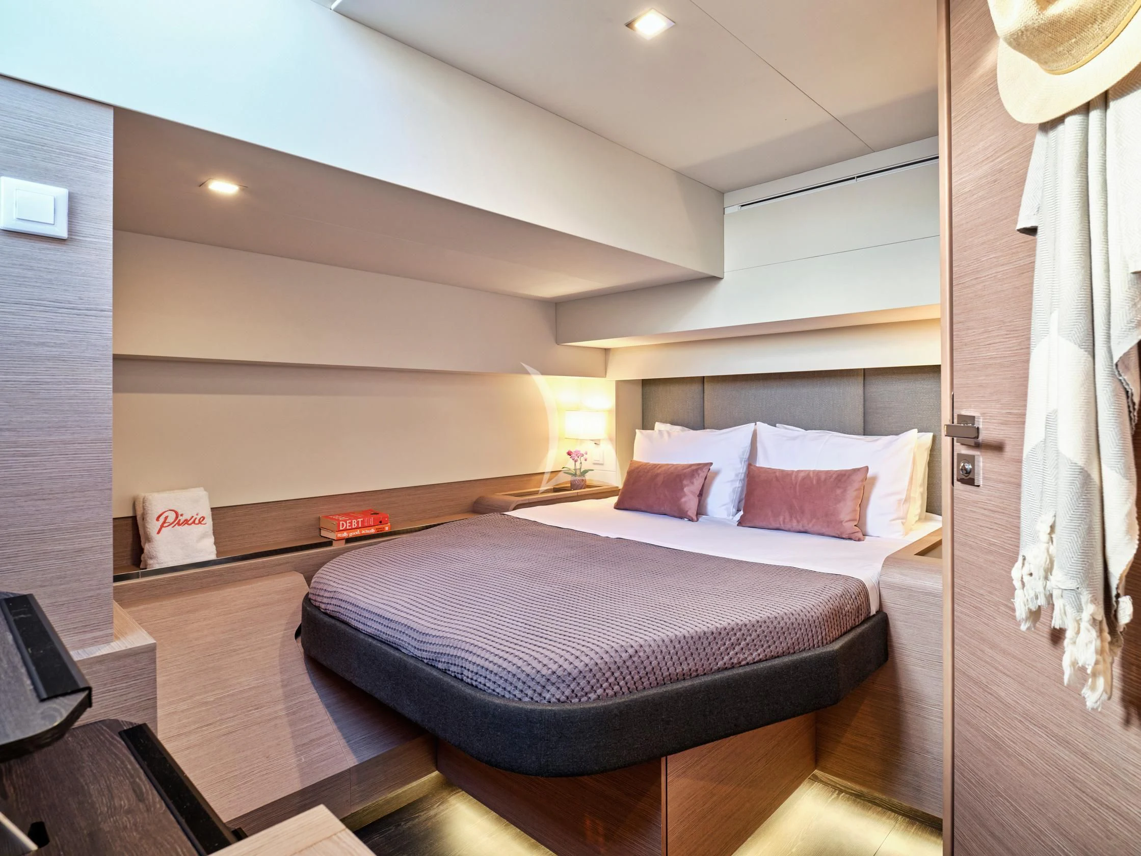 a bed in a room aboard PIXIE Yacht for Charter