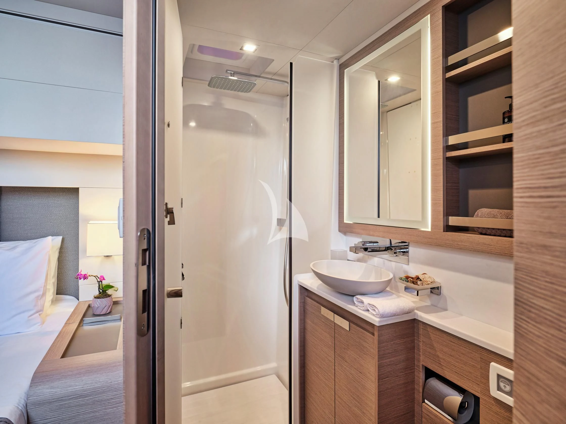 a bathroom with a sink and a mirror aboard PIXIE Yacht for Charter