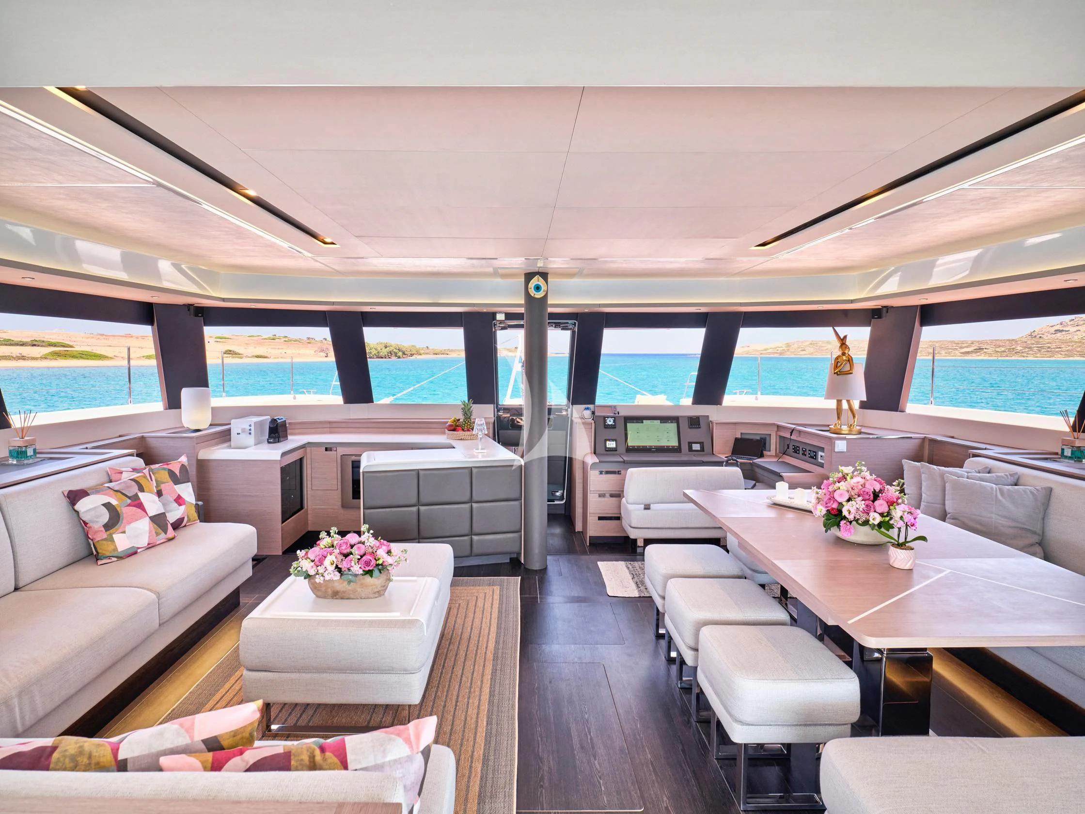 a living room with a large window aboard PIXIE Yacht for Charter