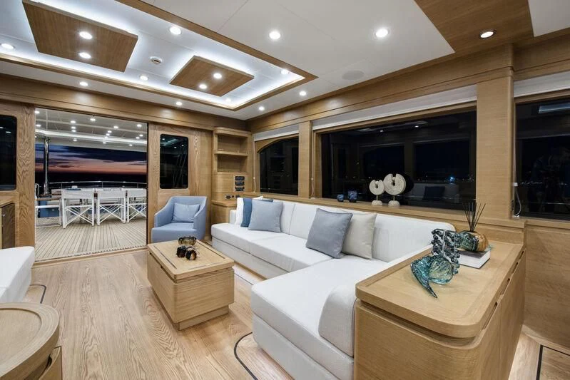 a living room with a large open floor plan aboard EMPIRE Yacht for Sale