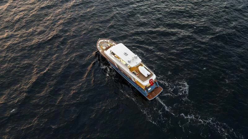 a boat in the water aboard EMPIRE Yacht for Sale
