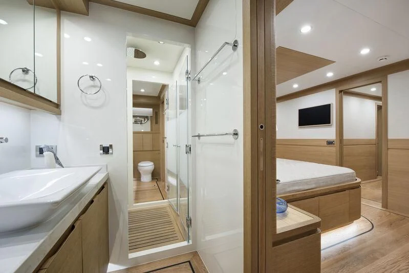 a bathroom with a shower and a sink aboard EMPIRE Yacht for Sale