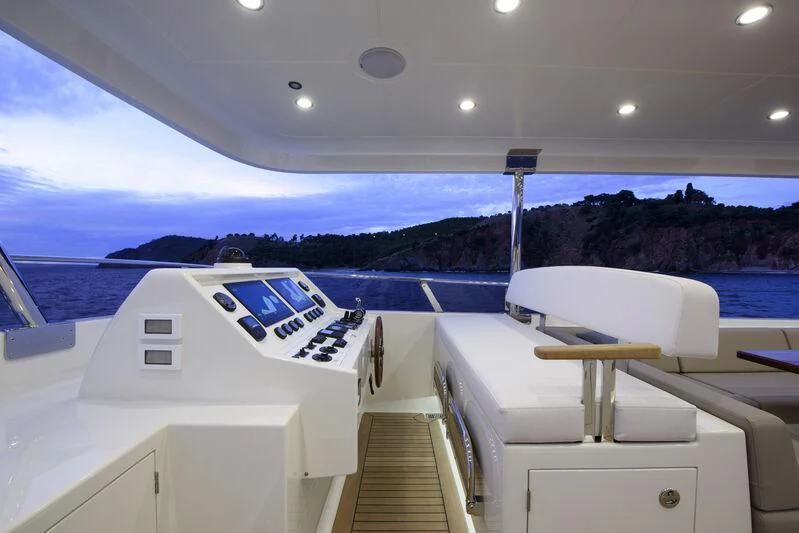 a boat on a deck aboard EMPIRE Yacht for Sale