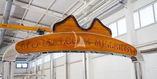 a sign on a building aboard MALCOLM MILLER Yacht for Sale