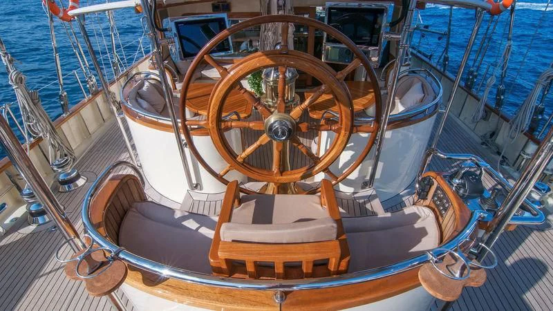 a close-up of a steering wheel aboard MALCOLM MILLER Yacht for Sale