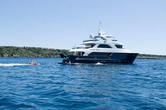 a boat on the water aboard INTRIGUE Yacht for Sale