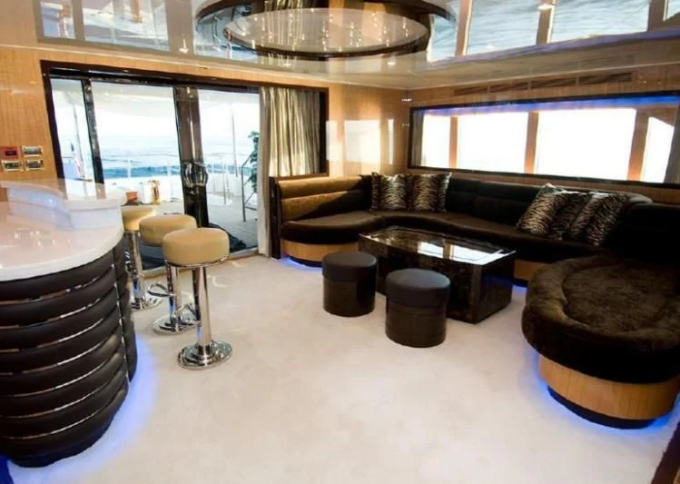 a living room with a large window aboard INTRIGUE Yacht for Sale