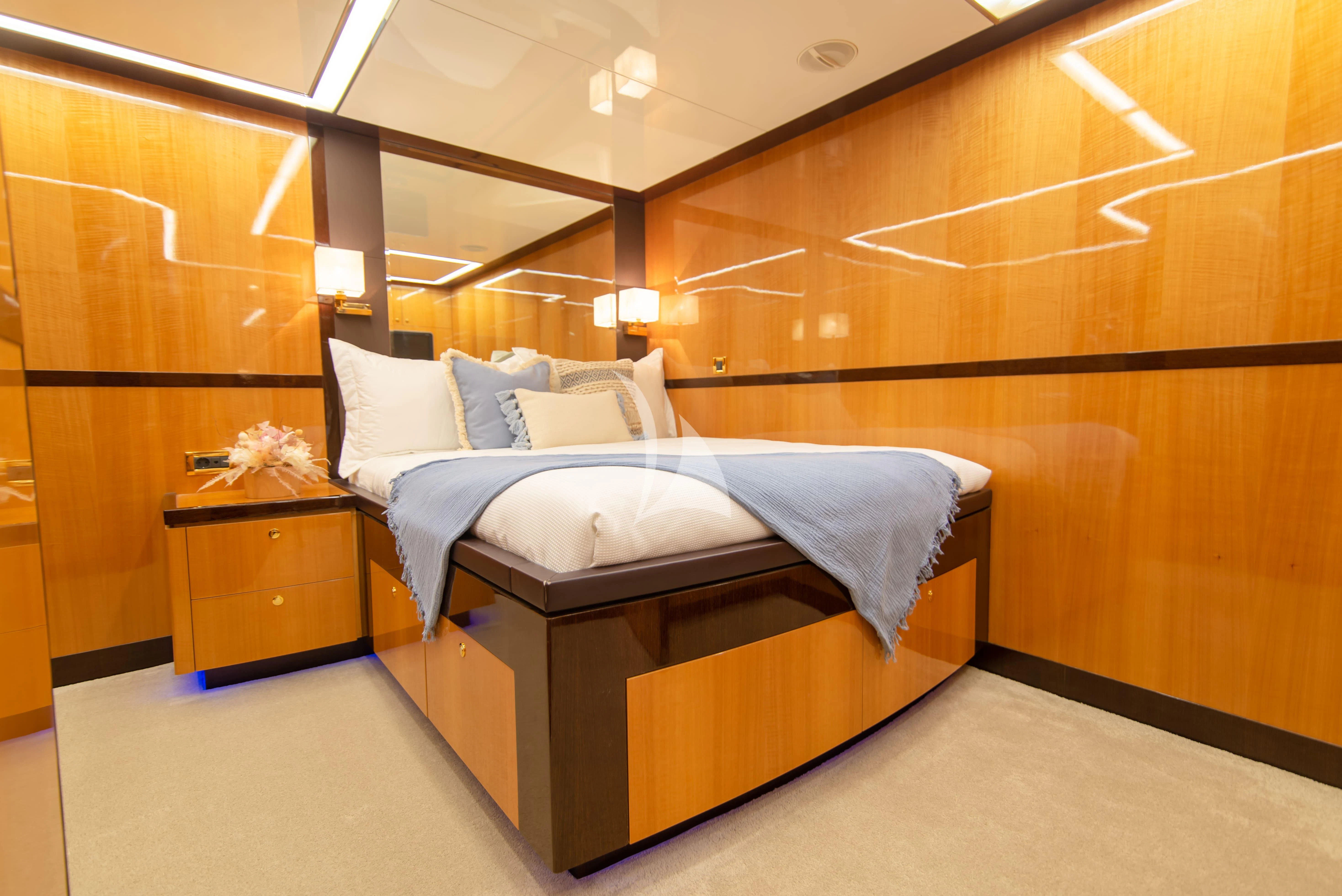 a bed in a room aboard INTRIGUE Yacht for Sale