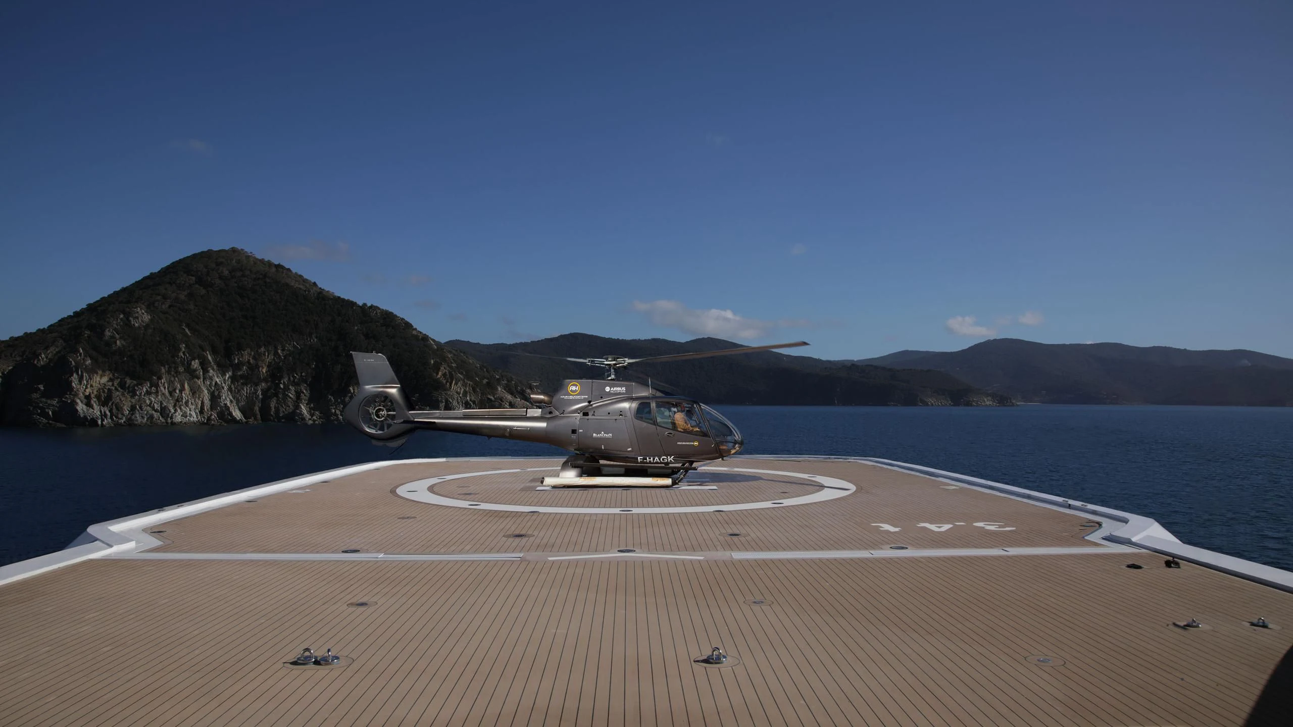 a car on a road aboard LUMINOSITY Yacht for Sale