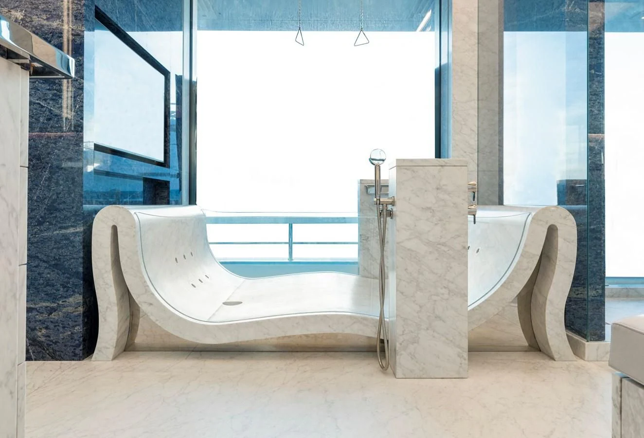 a bathtub in a room aboard LUMINOSITY Yacht for Sale