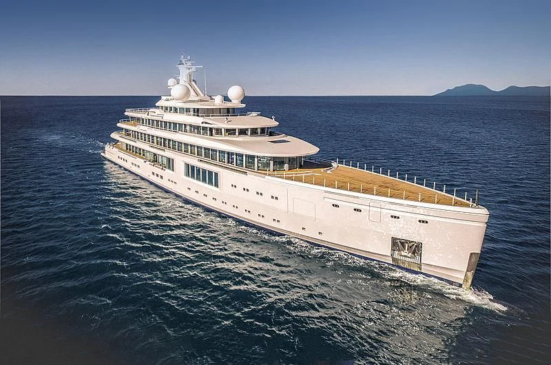a large white ship in the water aboard LUMINOSITY Yacht for Sale