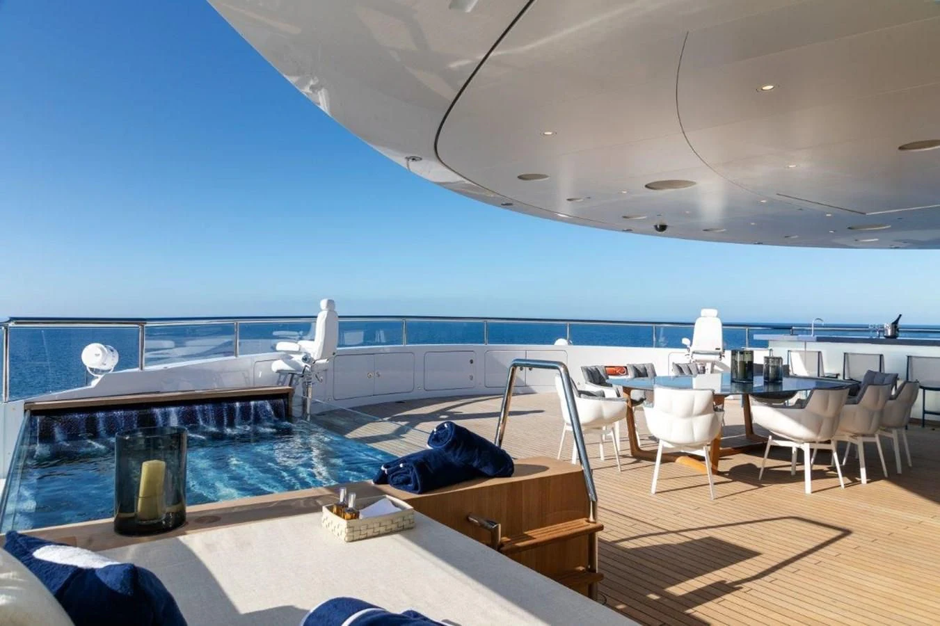 a pool on a deck aboard LUMINOSITY Yacht for Sale
