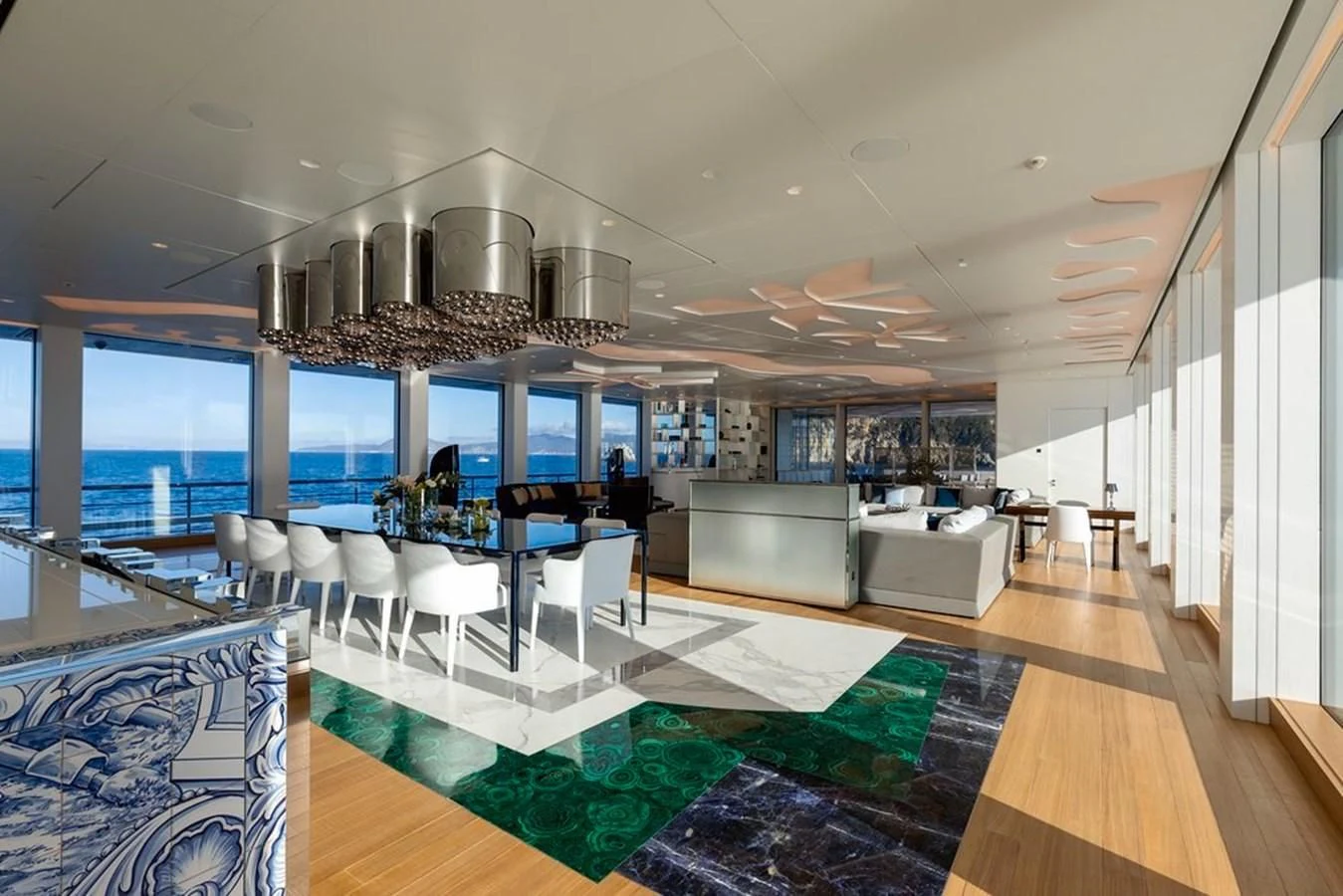 a large room with a large glass ceiling and a large open window aboard LUMINOSITY Yacht for Sale