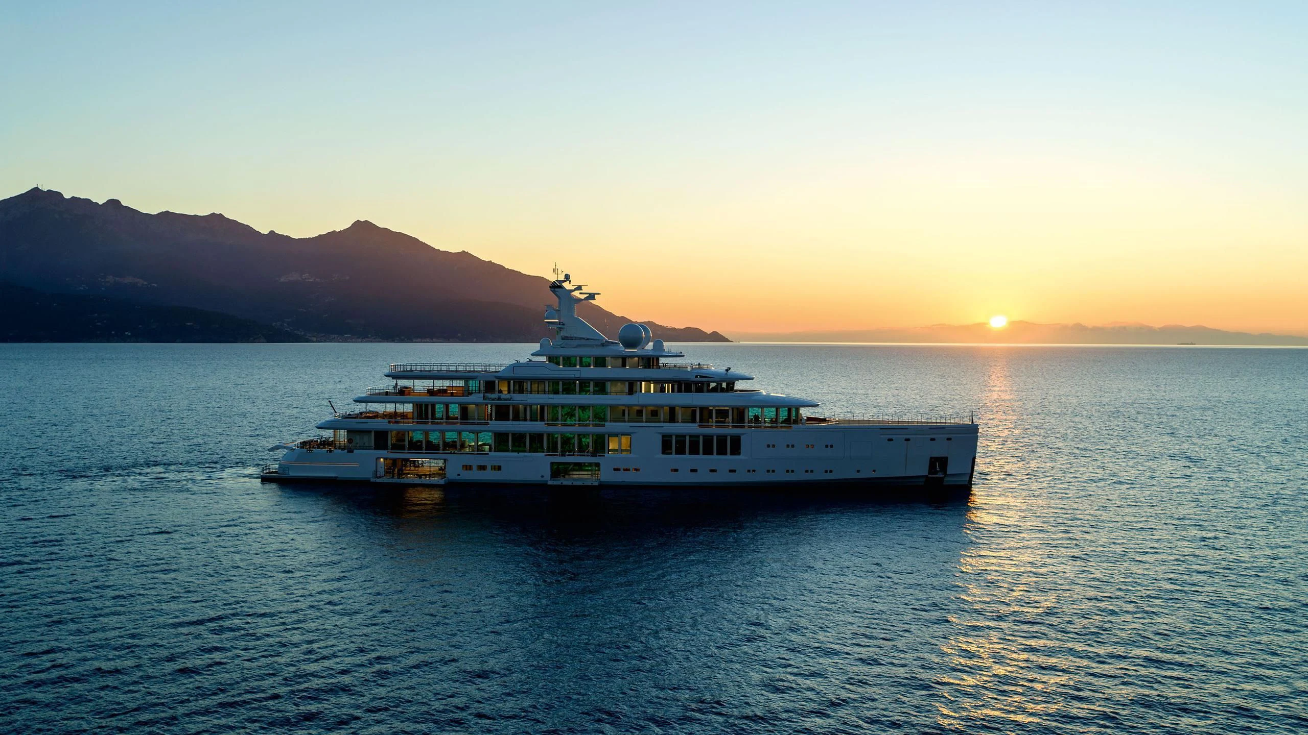 a ferry on the water aboard LUMINOSITY Yacht for Sale