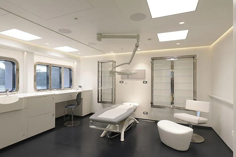 a room with a few sinks and a large window aboard LUMINOSITY Yacht for Sale