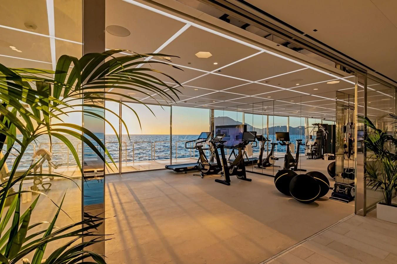 a room with a large pool aboard LUMINOSITY Yacht for Sale