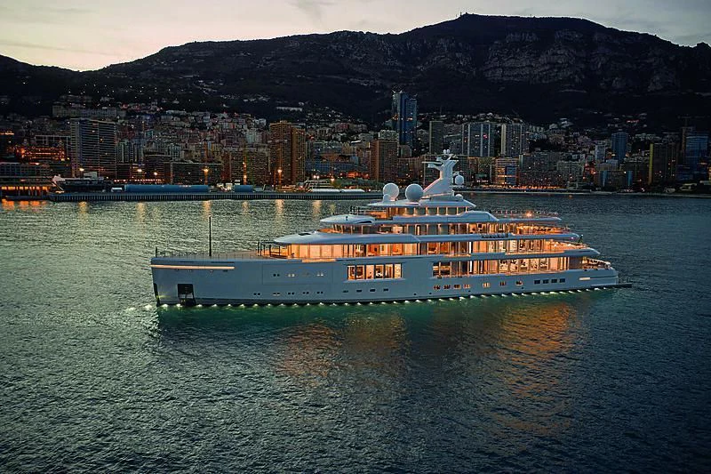 a large cruise ship in the water aboard LUMINOSITY Yacht for Sale