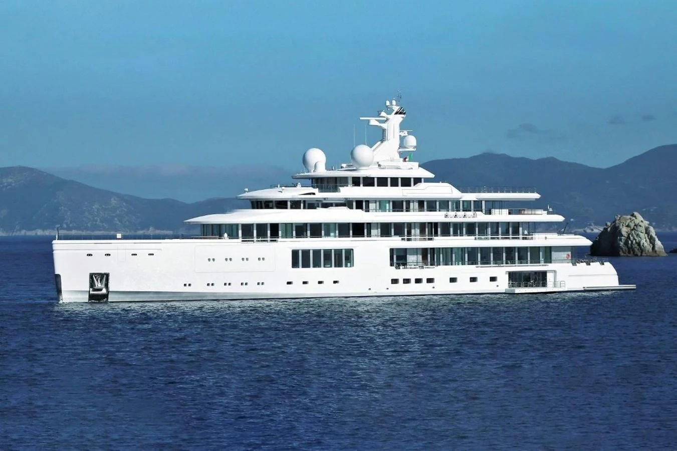 a large white yacht aboard LUMINOSITY Yacht for Sale