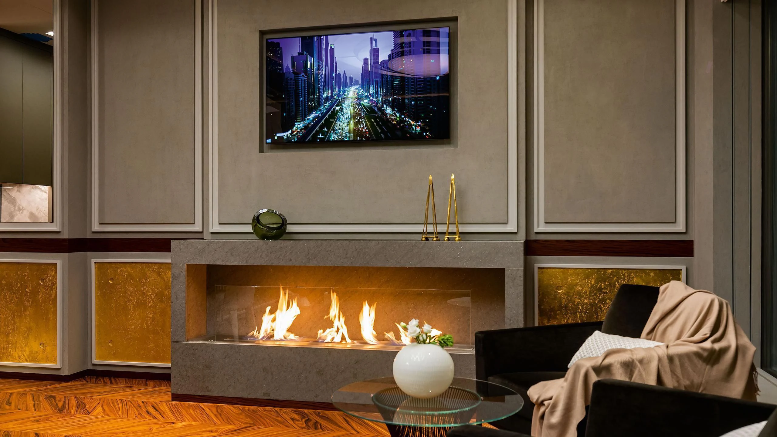 a fireplace with a television on aboard LUMINOSITY Yacht for Sale